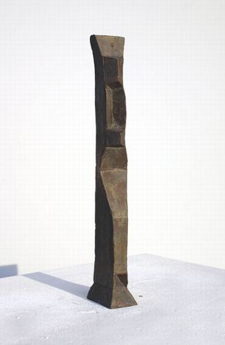 Kleine Figur mit Kopfputz